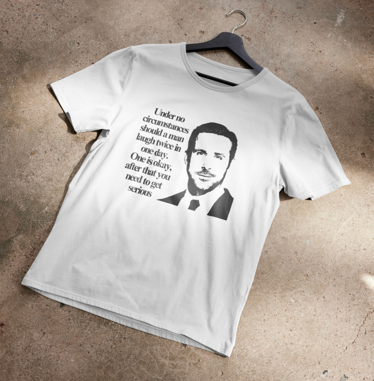 Under no circumstances should a man laugh twice in one day (Ryan Gosling) - Unisex Heavy Cotton Tee